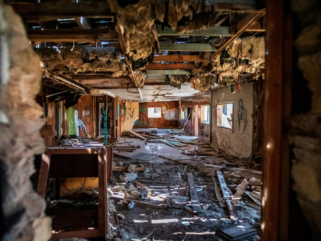 A room that has a bunch of debris on the floor